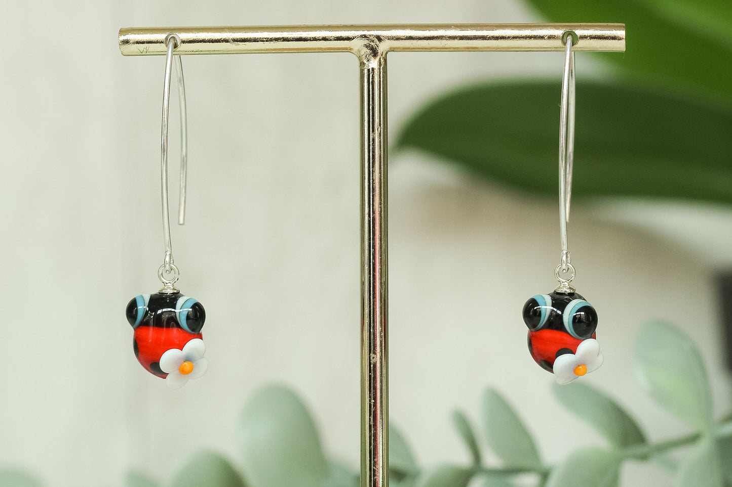 Pendientes largos mariquita