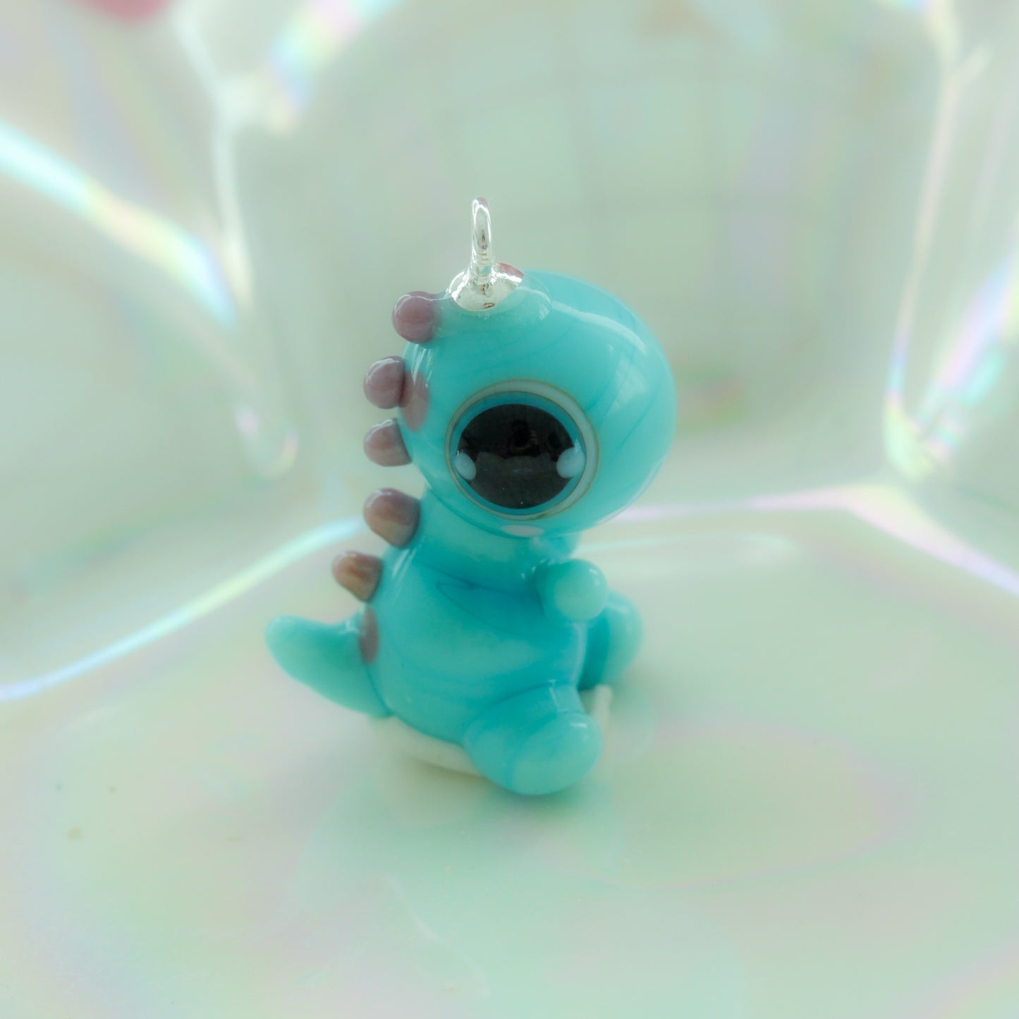 Collar de dinosaurio azul