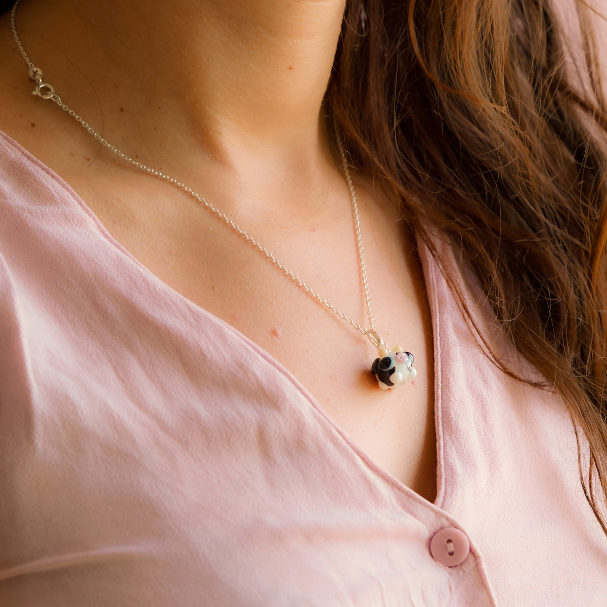 Charm colgante vaquita
