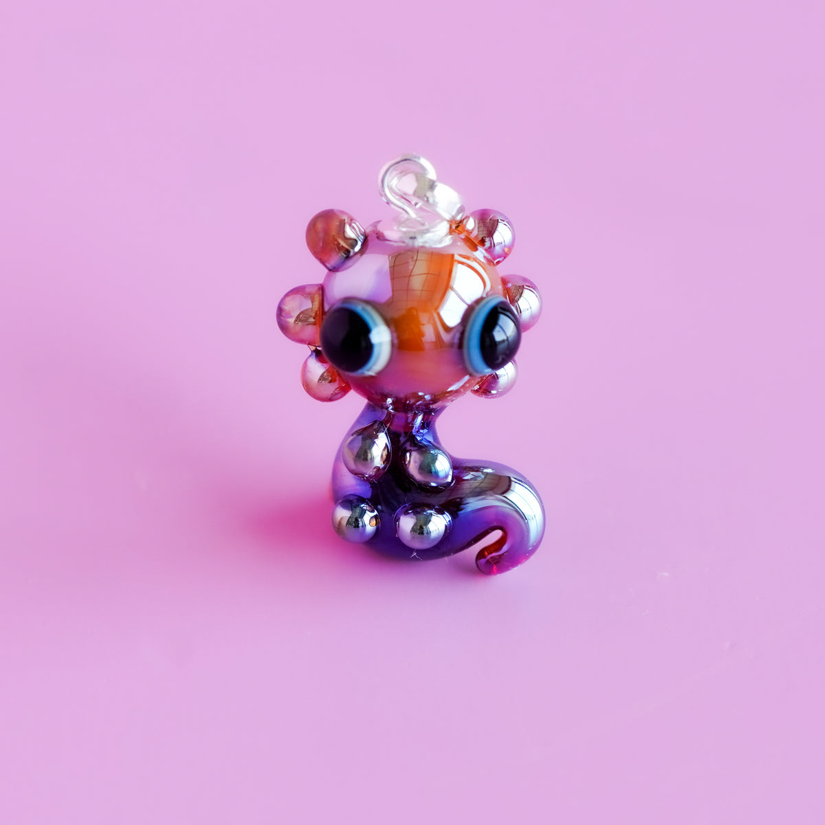 Charm colgante ajolote hojalata