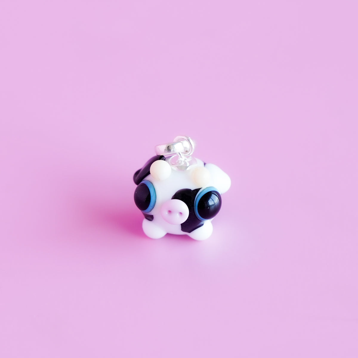Charm colgante vaquita